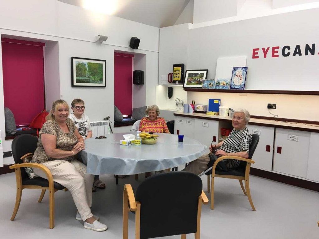 Image of EYECAN members sitting together at Westlea Centre